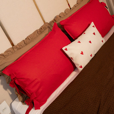 Almofada Baguete de Linho com Bordado de Corações | 50x30 cm